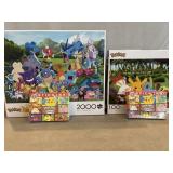 Two Pokémon Puzzels and Two 6 Packs of Pokémon