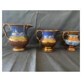 3 Copper Luster Creamers, 5 1/4" & 4 1/4"