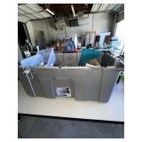 grey tub with first aid items