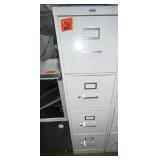 1 metal filing cabinet