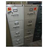 2 metal filing cabinets