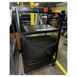 Black metal rolling cart and tv