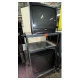 rolling cart and 2 tvs