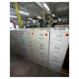 4 metal filing cabinets