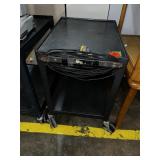 small black rolling metal cart
