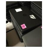 Stack of 8 HP laptops