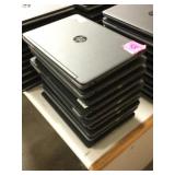 Stack of 10 HP laptops