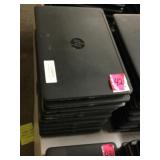Stack of 10 HP laptops