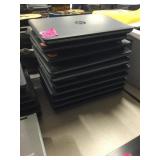 Stack of 10 HP laptops