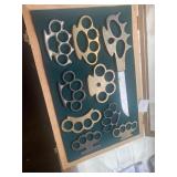 8 brass nuckles and 1 brass nuckle Knuckles in cas