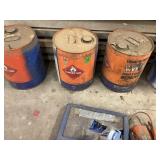 Five empty metal cans