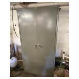 Metal locker with contents