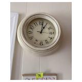 2 signs and a clock