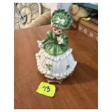 glass music box doll green