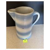 Blue and white tall pitcher pottery like