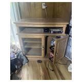 Entertainment Center with VHS Tapes