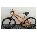 Orange Specialized Hard Rock Mountain Bicycle. Orange Specialized Hard Rock Mountain Bicycle.