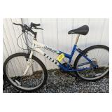 Blue And White Titan Trailblazer Bicycle. Side