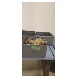 Three metal storage boxes with rope and cable