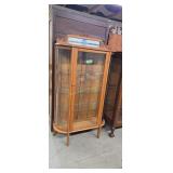 Antique oak bow glass China closet with beveled