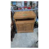 Oak roll around double door cabinet
