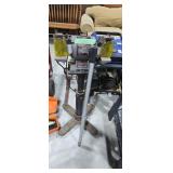 Bench grinder with stand