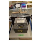 Router table with vintage ammo box