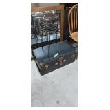 Foot locker with metal plant stand