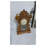 Antique oak kitchen clock with pendulum and key