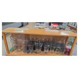Vintage display cabinet with Coca-Cola items 86