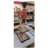 Countertop drill press with tap and die set
