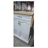 Roll around kitchen utility cabinet with dropped