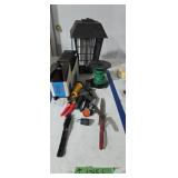 Bug light saw horse brackets hand tools gas cans