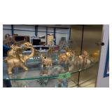 Five gold elephants