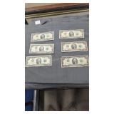 Six $2 bills