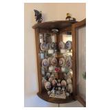 contents of corner cabinet Danbury mint eggs