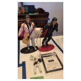 three Elvis Presley figures with coas