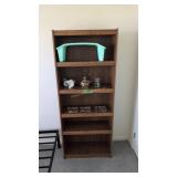 bookshelf with Marine corps shooting metals