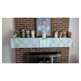 items on fireplace figurines Church books etc