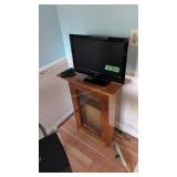 small Hitachi flat screen TV with display cabinet