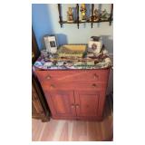 Wooden Storage Cabinet 29-in Long With Items On