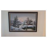 frame print of a winter snow scene and sewing