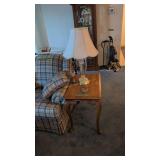 oak end table with lamp and figurine