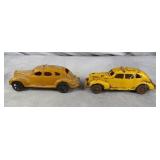 Two Antique Arcade Cast Iron Yellow Taxi Cabs