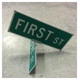 First & Grove street sign