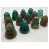 Group of Thirteen Hemingray Glass Insulators