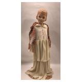 38-Inch Girl Figurine with Layered Dress and Knitted Scarf