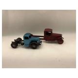 Two Toy Trucks: Red 1926 Replica & Blue Mack