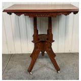 Victorian Eastlake Parlor Table with Original Casters