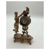 New Haven Clock with Metal Figurine